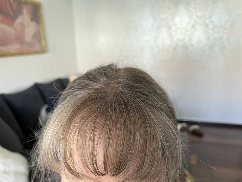 Bangs styled with the Dyson Airwrap.